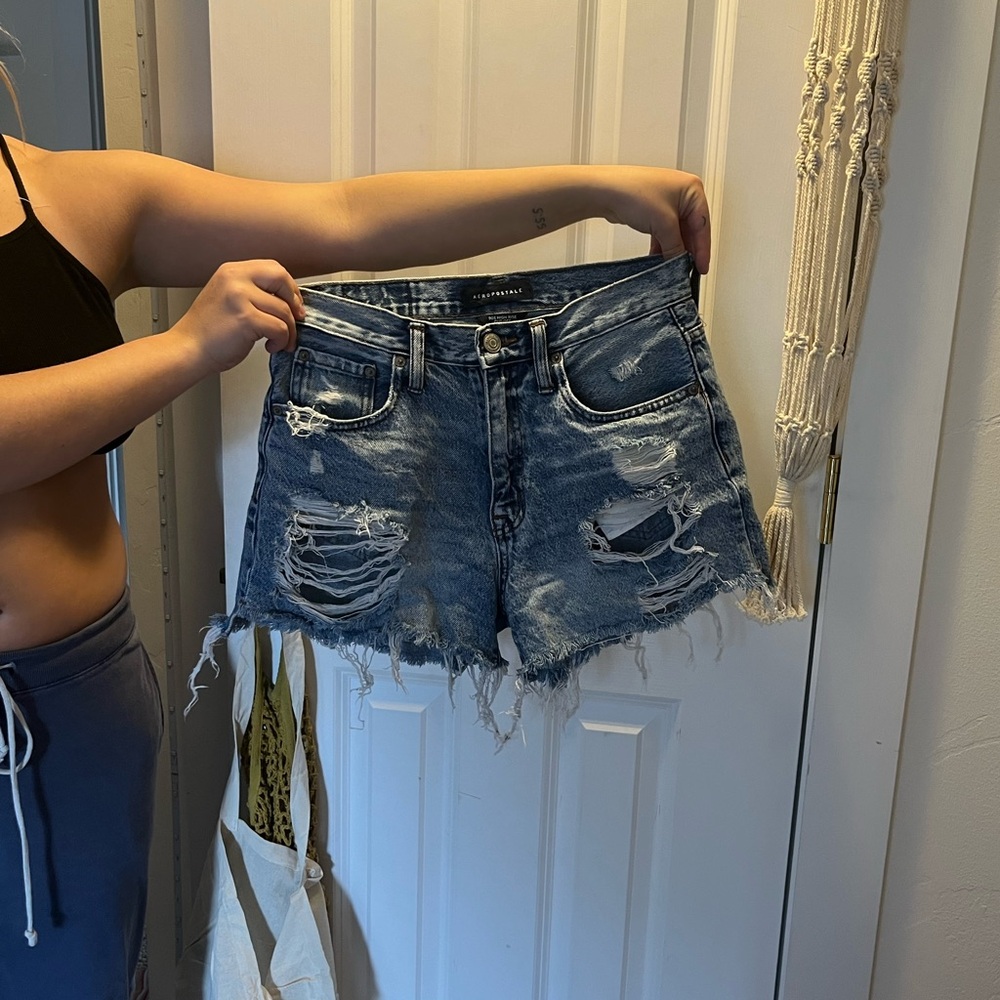 Light wash denim with rips